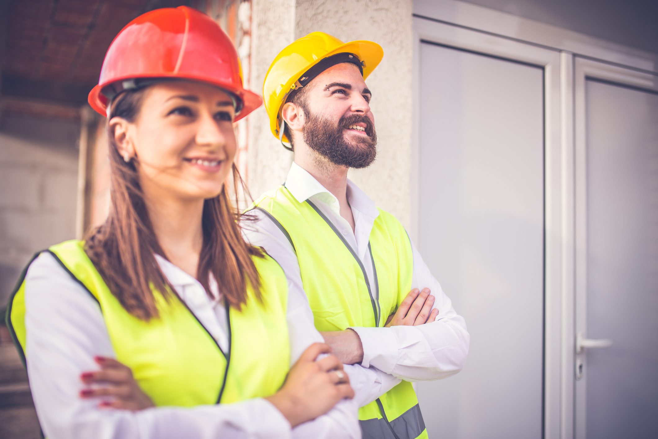 Engineers wearing helmets and vests